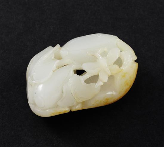 A Chinese white and russet skin jade melon carving, 19th century, 5.1cm